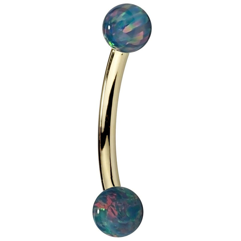 14K yellow gold curved barbell with teal simulated opal ball ends, side view