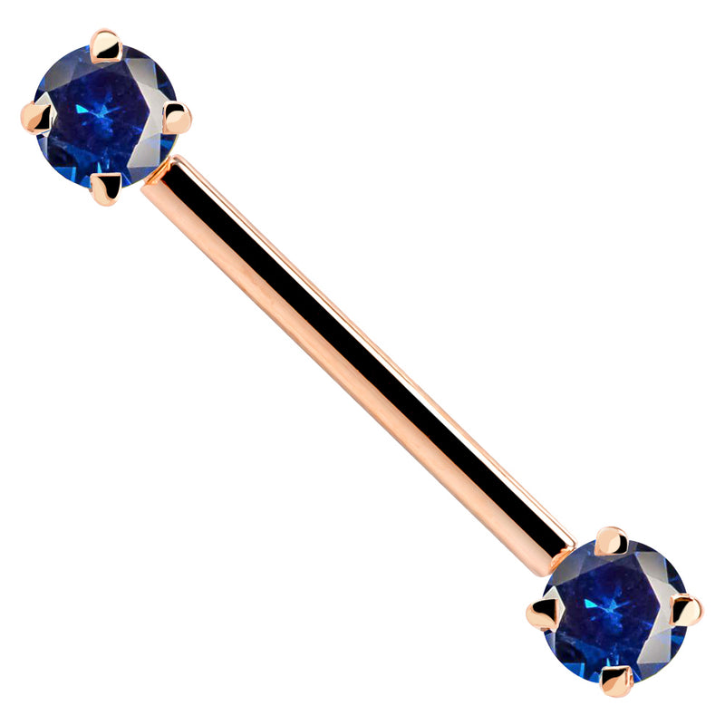 14k rose gold straight barbell with dual blue CZ prong-set ends, angled product view