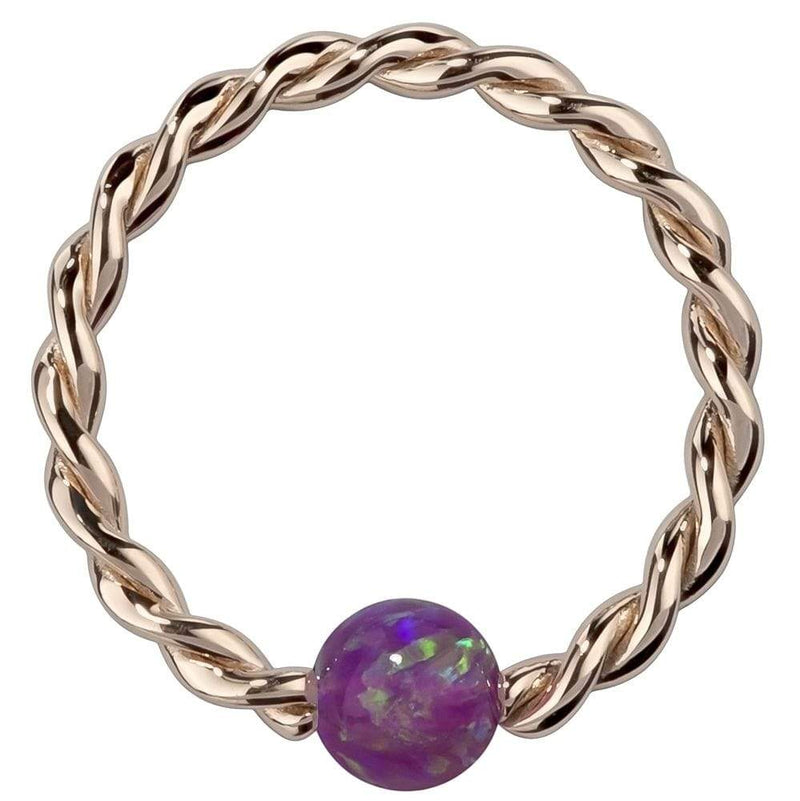 14K rose gold twisted captive bead ring with purple opal bead, front view on white background
