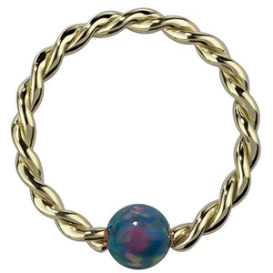 14K yellow gold twisted captive bead ring with teal simulated opal bead, front view