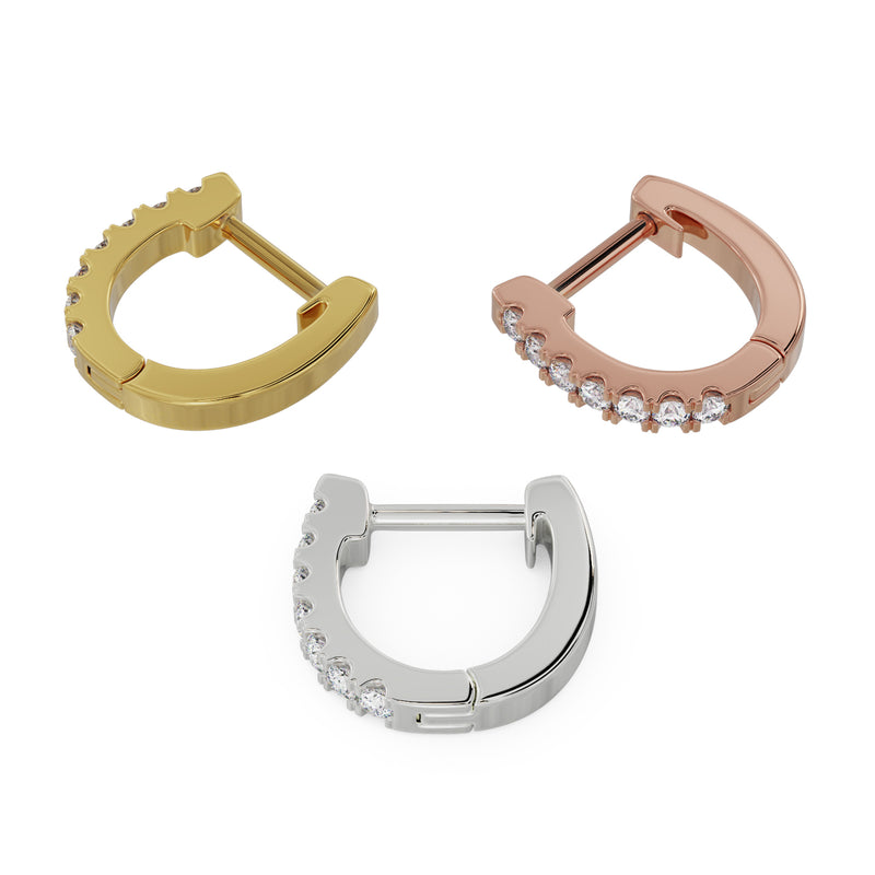 All three metal options of 13mm diamond huggie hoops side by side: yellow gold, rose gold, and white gold