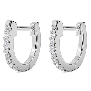 14k white gold diamond huggie hoop earrings pair, front view showing prong-set diamonds along outer arc