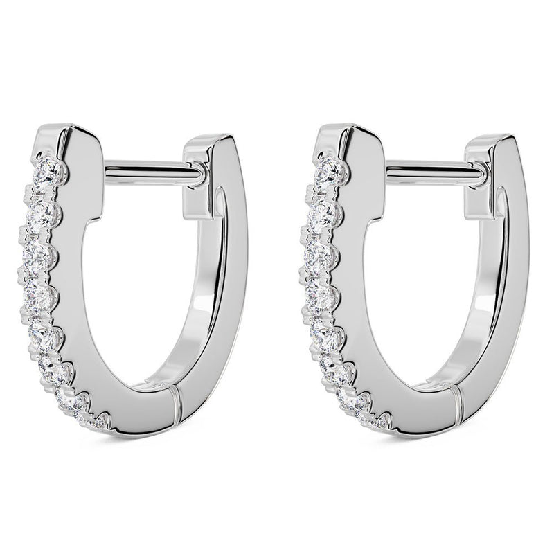 14k white gold diamond huggie hoop earrings pair, front view showing prong-set diamonds along outer arc