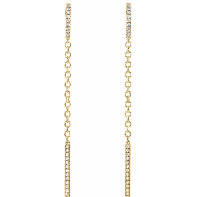 Close-up of 14k yellow gold diamond chain dangle earrings highlighting pavé bar and chain detail