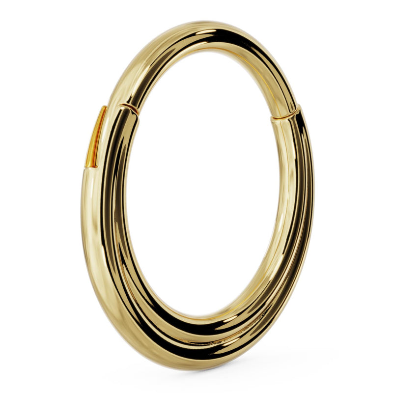 Angled side profile of larger 14k yellow gold two-band clicker hoop showing substantial band thickness