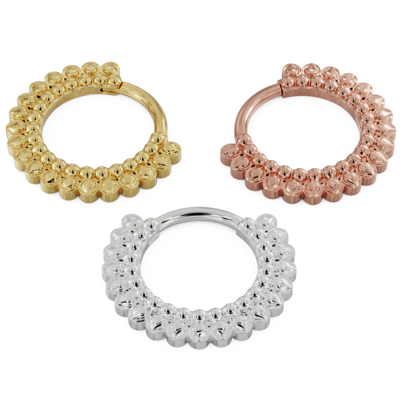 Yellow gold, rose gold, and white gold 14k petal clicker hoops shown together, larger size comparison