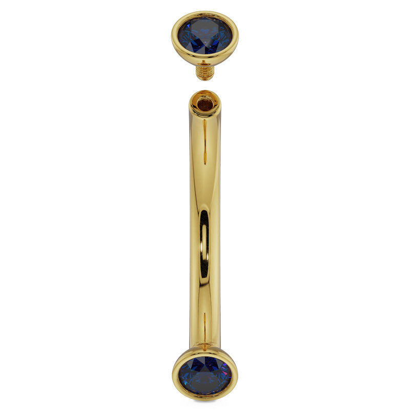 14k yellow gold blue sapphire curved barbell with top ball detached showing threaded post