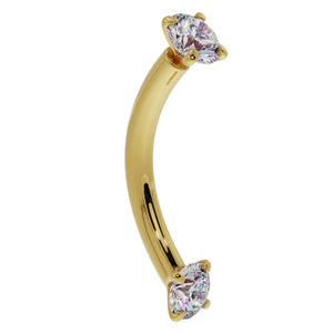 14k yellow gold CZ prong-set curved barbell, angled side view showing banana curve and both end gems
