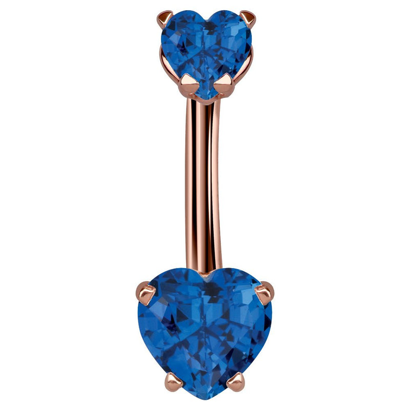 14k rose gold navel ring with dual sapphire blue CZ heart stones in prong settings, front view
