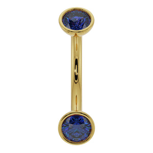 14k yellow gold blue sapphire bezel-set curved barbell, front view showing dual round gemstones