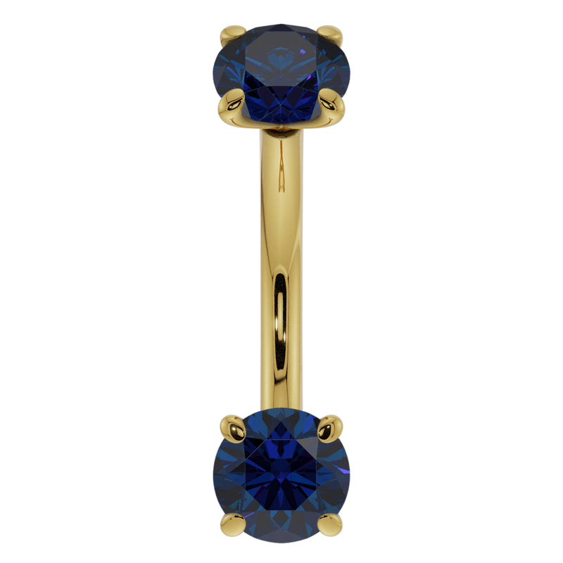 14K yellow gold 14G blue sapphire curved barbell, front view with larger-gauge sapphire ends