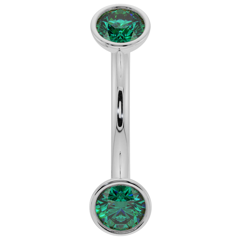 14k white gold 14G curved barbell with larger bezel-set round emeralds, front view
