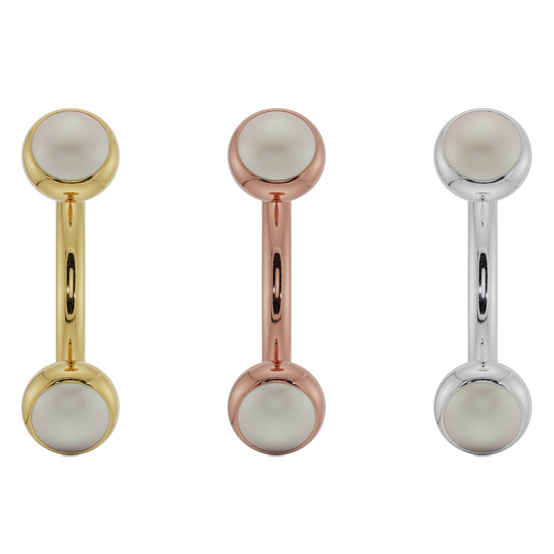 Pearl bezel-set curved barbell in all three 14k gold options: yellow, rose, and white gold