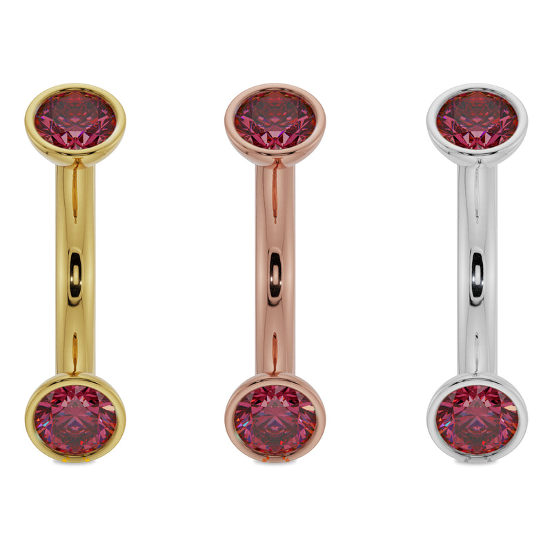 Ruby bezel curved barbell with larger 4mm stones in yellow gold, rose gold, and white gold side by side