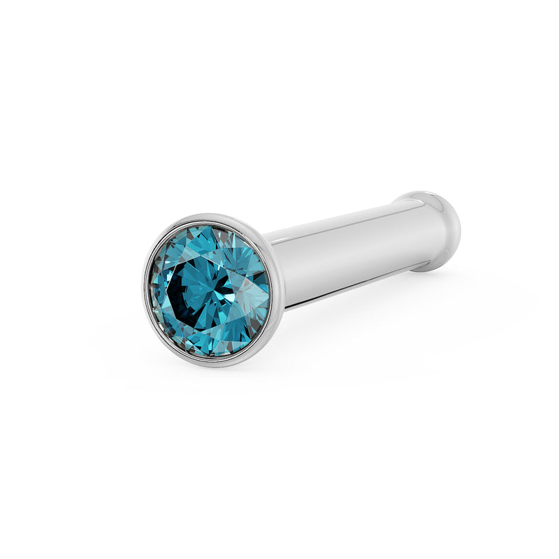 14k white gold blue diamond bezel nose bone stud, angled view showing polished post and bezel