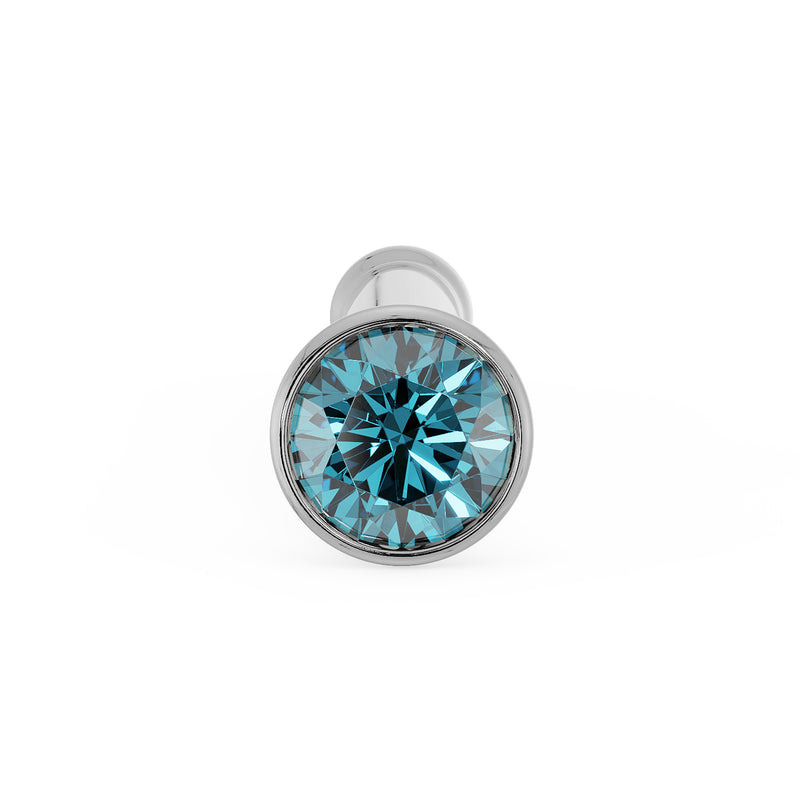 Front-facing close-up of 1.5mm blue diamond in white gold bezel setting on bone nose stud