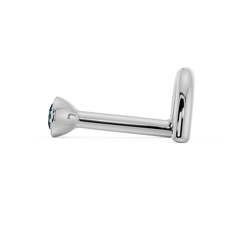 Side profile of white gold blue diamond nose bone stud showing straight post and ball end detail