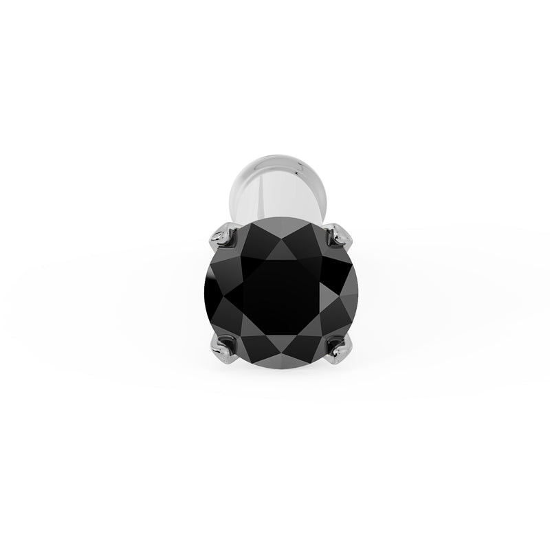Top-down close-up of 1.5mm black diamond in four-prong white gold setting on nose bone post