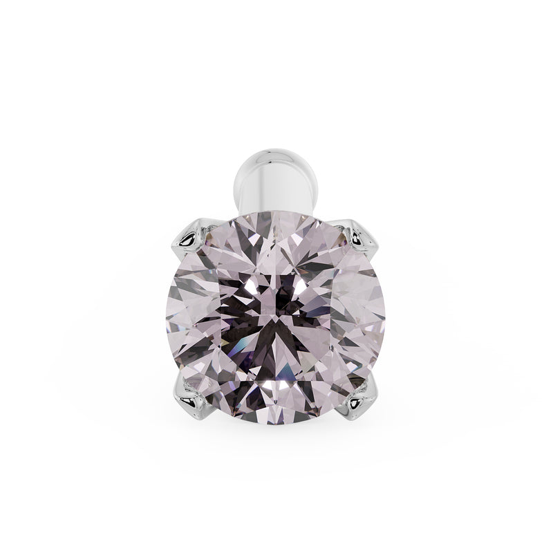 Overhead close-up of 2.5mm pink diamond in white gold 4-prong setting with bone post visible