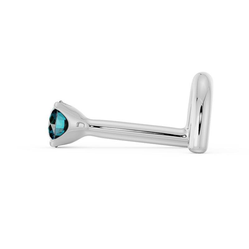 Side profile of 14k white gold blue diamond nose stud showing L-post shape and low-profile setting