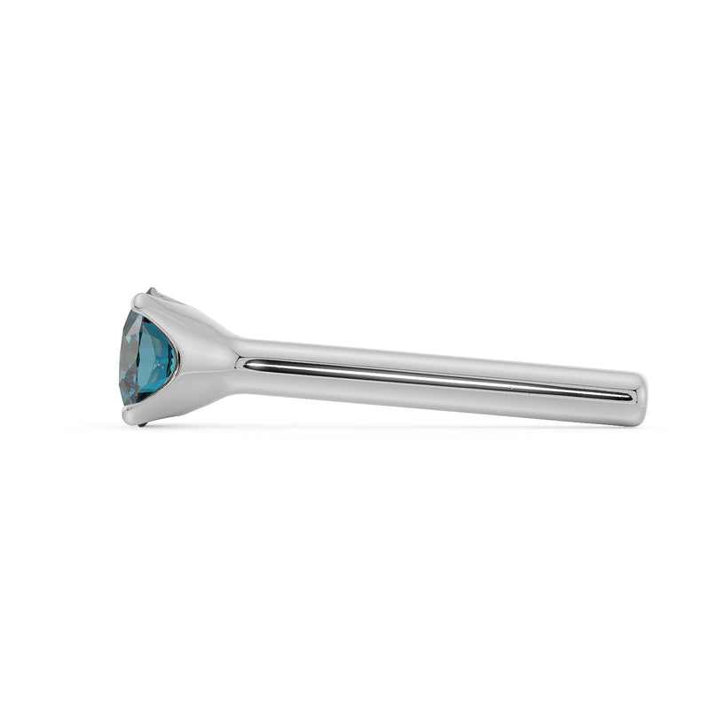 Side profile of white gold blue diamond nose bone stud showing straight post length and prong base