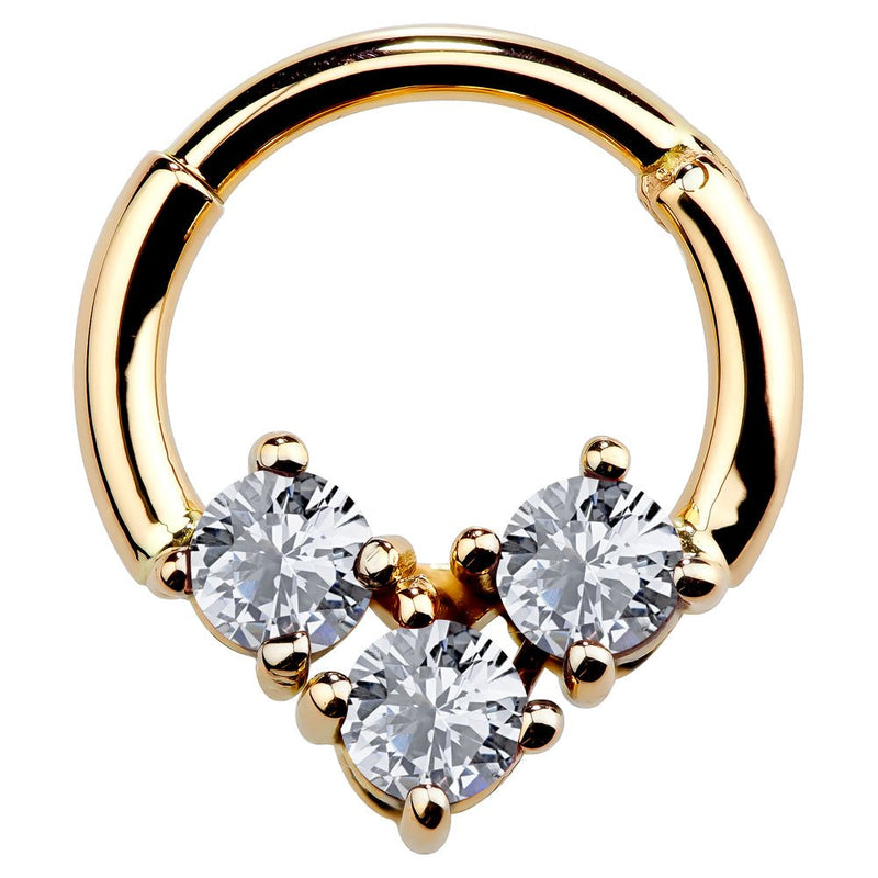 14K yellow gold hinged segment clicker ring with three prong-set CZ stones in triangular cluster