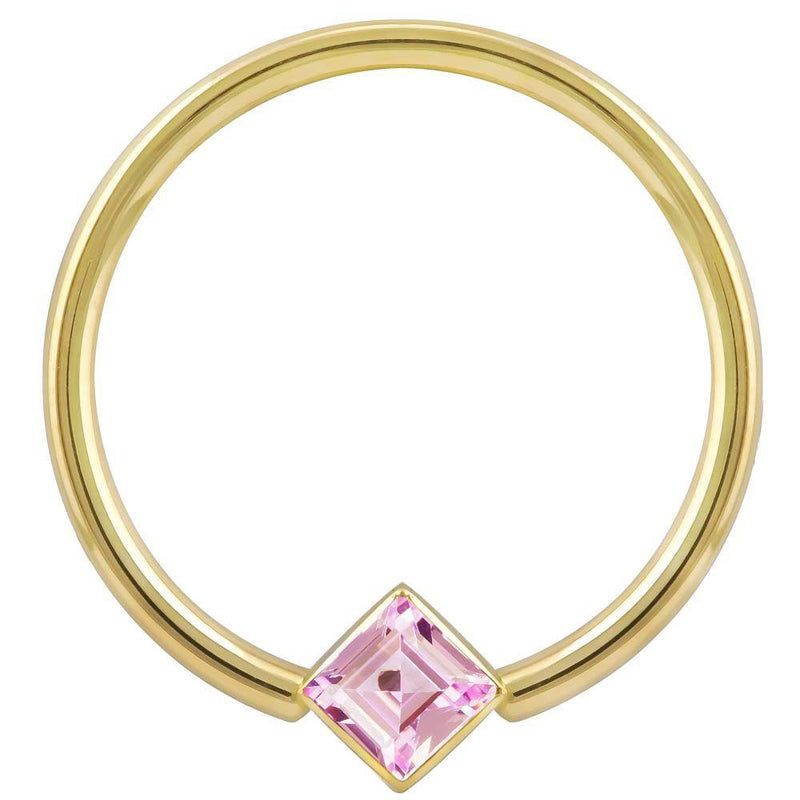14k yellow gold fixed bead ring with pink princess-cut CZ in corner-mount bezel, front view