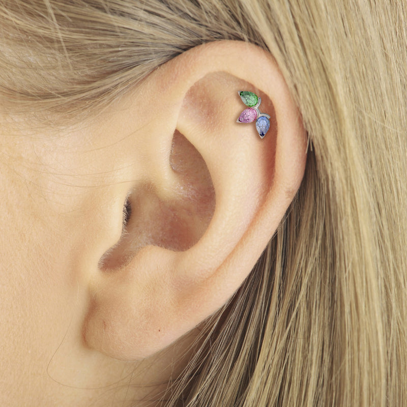 Three pear gemstone flat back stud worn in a helix cartilage piercing, front-facing view
