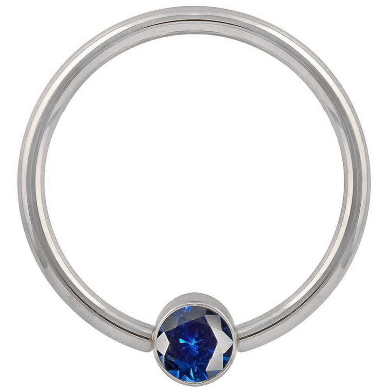 14k white gold blue cubic zirconia bezel fixed bead ring, straight-on front view showing full hoop shape