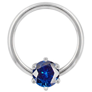 14k white gold captive bead ring with blue round-cut CZ prong set at base, front view