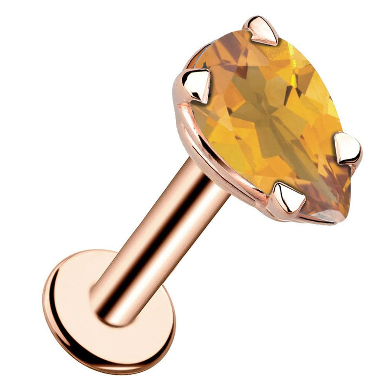 14k rose gold citrine pear-shaped flat back labret stud with prong setting, angled front view