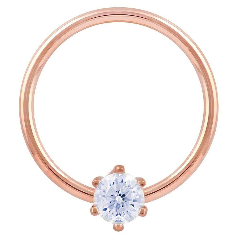 14k rose gold CZ fixed bead ring, larger hoop diameter showing warm rose tone and prong-set CZ
