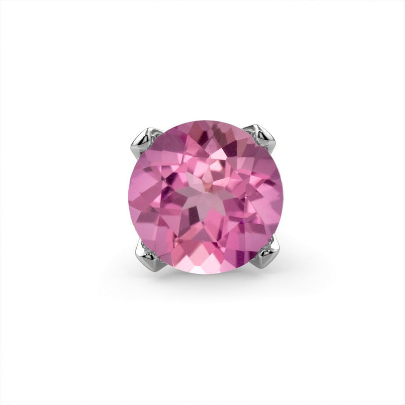 Close-up of genuine pink tourmaline in four-prong white gold setting, front view showing faceted gemstone