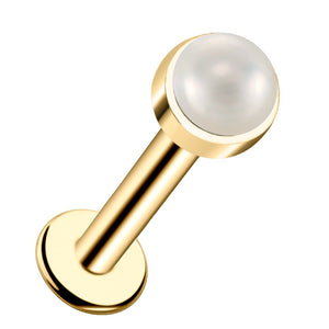 14k yellow gold flat back labret with 3mm pearl cabochon in bezel setting, angled product view