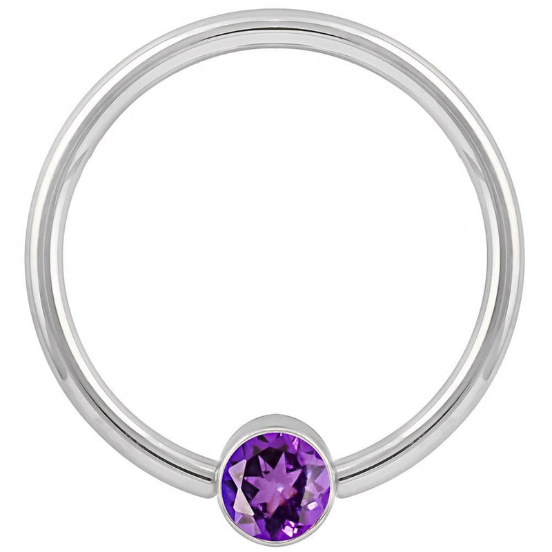 14k white gold fixed bead ring with purple CZ bezel, smaller gauge shown front view