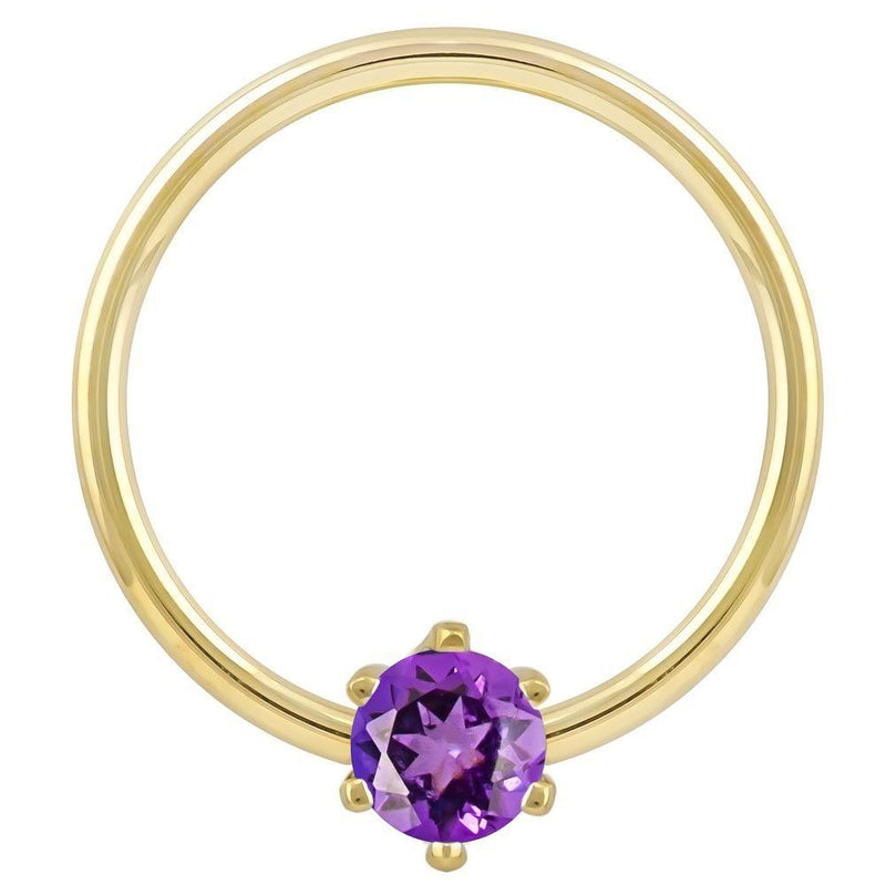 14k yellow gold fixed bead ring with round purple CZ in prong setting, front view