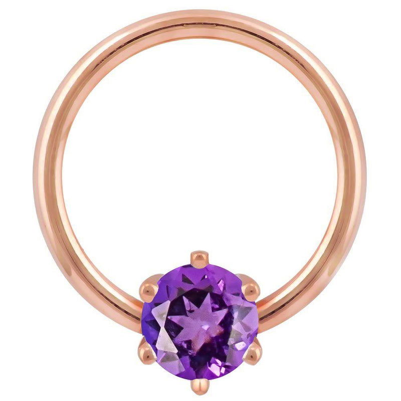 14k rose gold fixed bead ring with round purple cubic zirconia in six-prong setting, front view