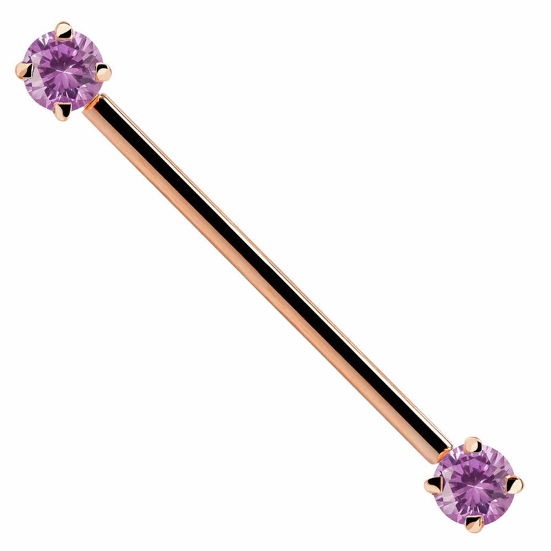 14k rose gold industrial barbell with pink CZ ends, prong-set round-cut gems, front view