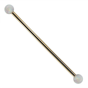 14k yellow gold industrial barbell with white synthetic opal ball ends, front view