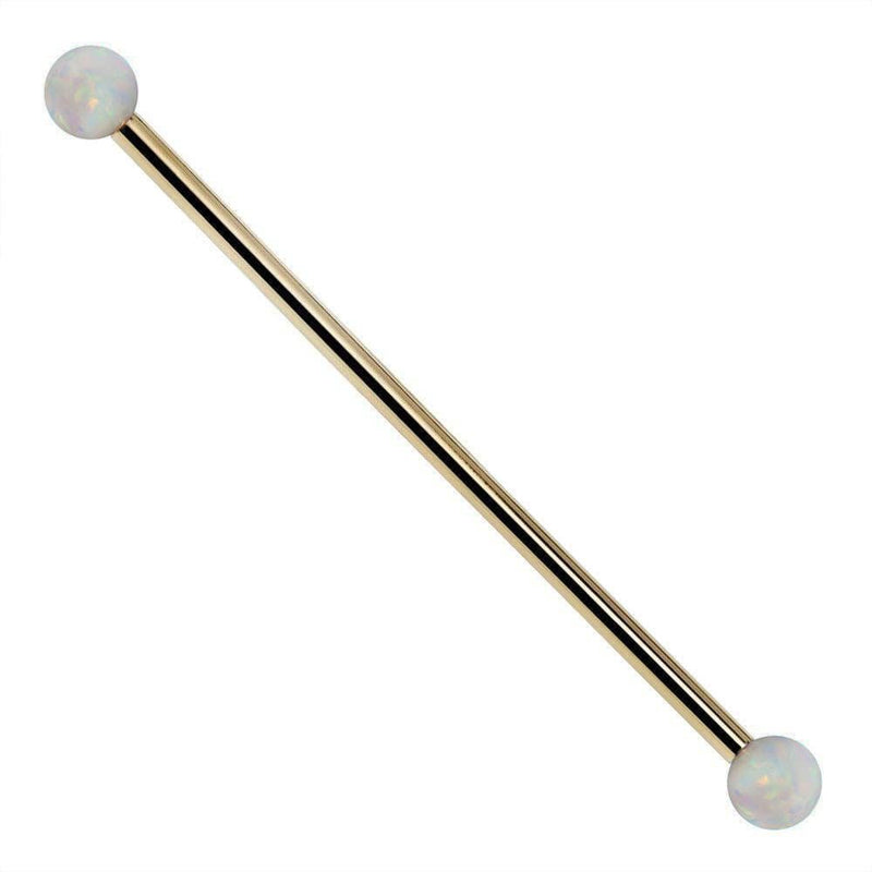 14k yellow gold industrial barbell with white synthetic opal ball ends, front view