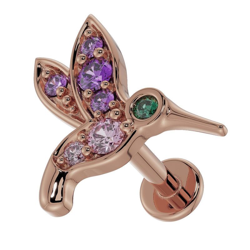 14K rose gold hummingbird labret earring with gemstone detail, angled view showing flat back hardware