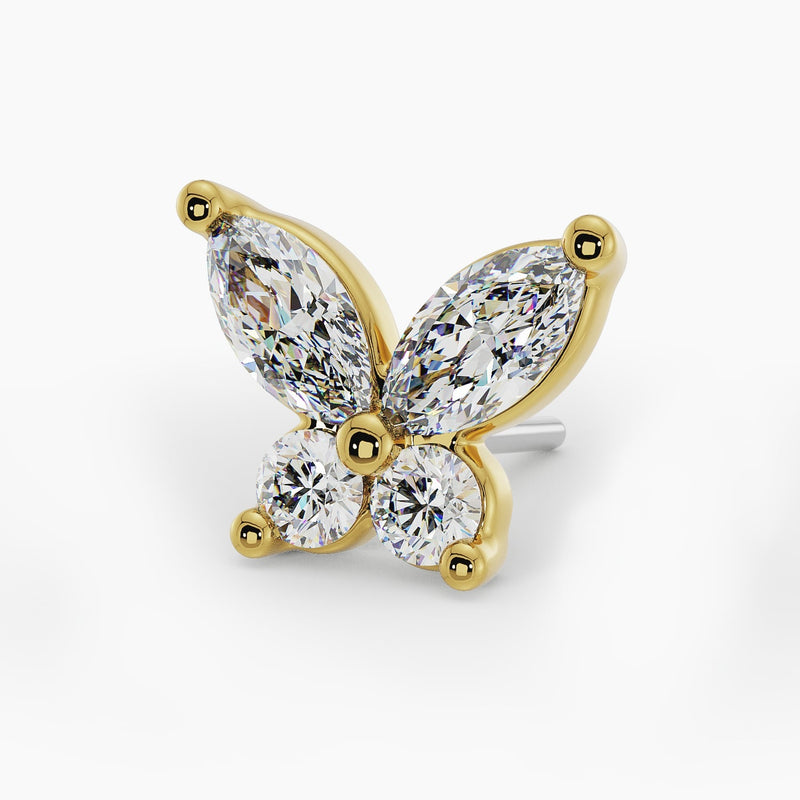 Close-up of 14k yellow gold butterfly stud end showing marquise and round diamond wing setting detail