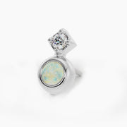 14k white gold opal and diamond pushpin end, angled view showing bezel opal below tilted diamond setting