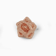 14k rose gold rose flower threadless piercing end, angled view with warm blush-pink metal finish