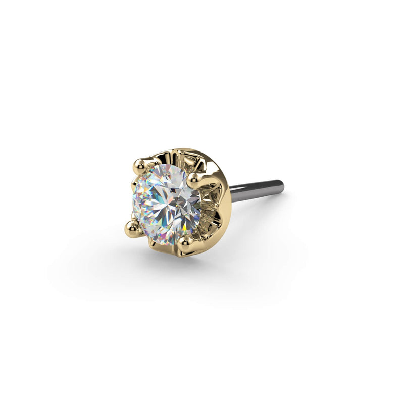 Close-up of 2mm VS1 diamond in illusion setting on 14k yellow gold threadless push-pin end, top view