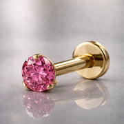 14k yellow gold pink diamond flat back labret stud with 3-prong setting, angled studio shot