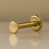 14K yellow gold 2.5mm disc flat back labret stud, angled view showing post and flat disc backing