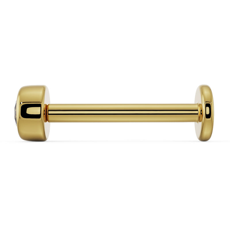 Side profile of 14k yellow gold CZ bezel flat back labret showing post length and flat disc backing