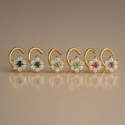 14K yellow gold CZ flower nose ring twist shown in six gemstone color options side by side