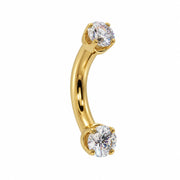 Side view of 14k gold curved barbell with 2mm clear stones